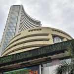 मार्केट ओपनिंग बेल: Sensex Gains 82 अंक, Nifty Flat इन ओपनिंग ट्रेड, PSU डिफेंस स्टॉक रैली