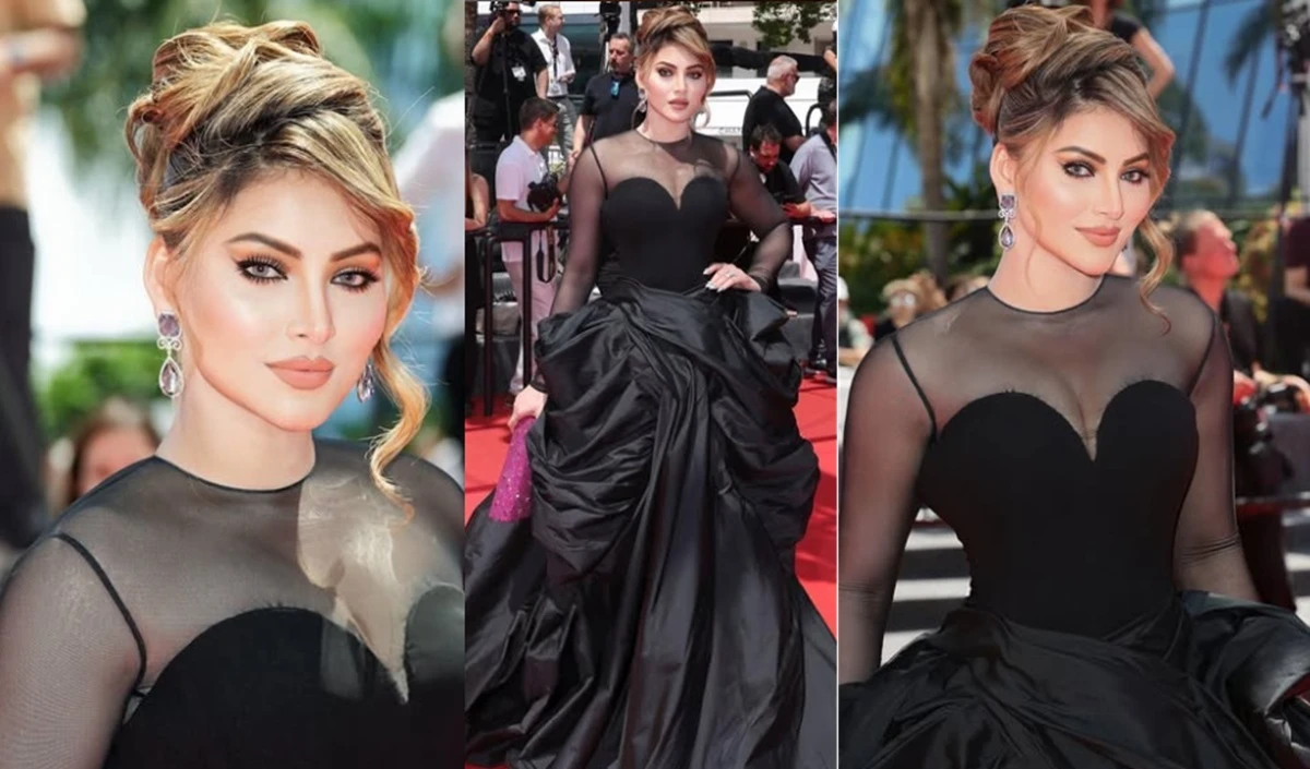 कान 2025 | उर्वशी राउतला उफ़ पल शिकार, कान फिल्म महोत्सव में एक फटे हुए पोशाक पहनी। वीडियो