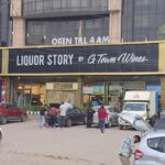 98.5 करोड़ रुपये में गुरुग्राम में शराब का एक अनुबंध किसने खरीदा था?